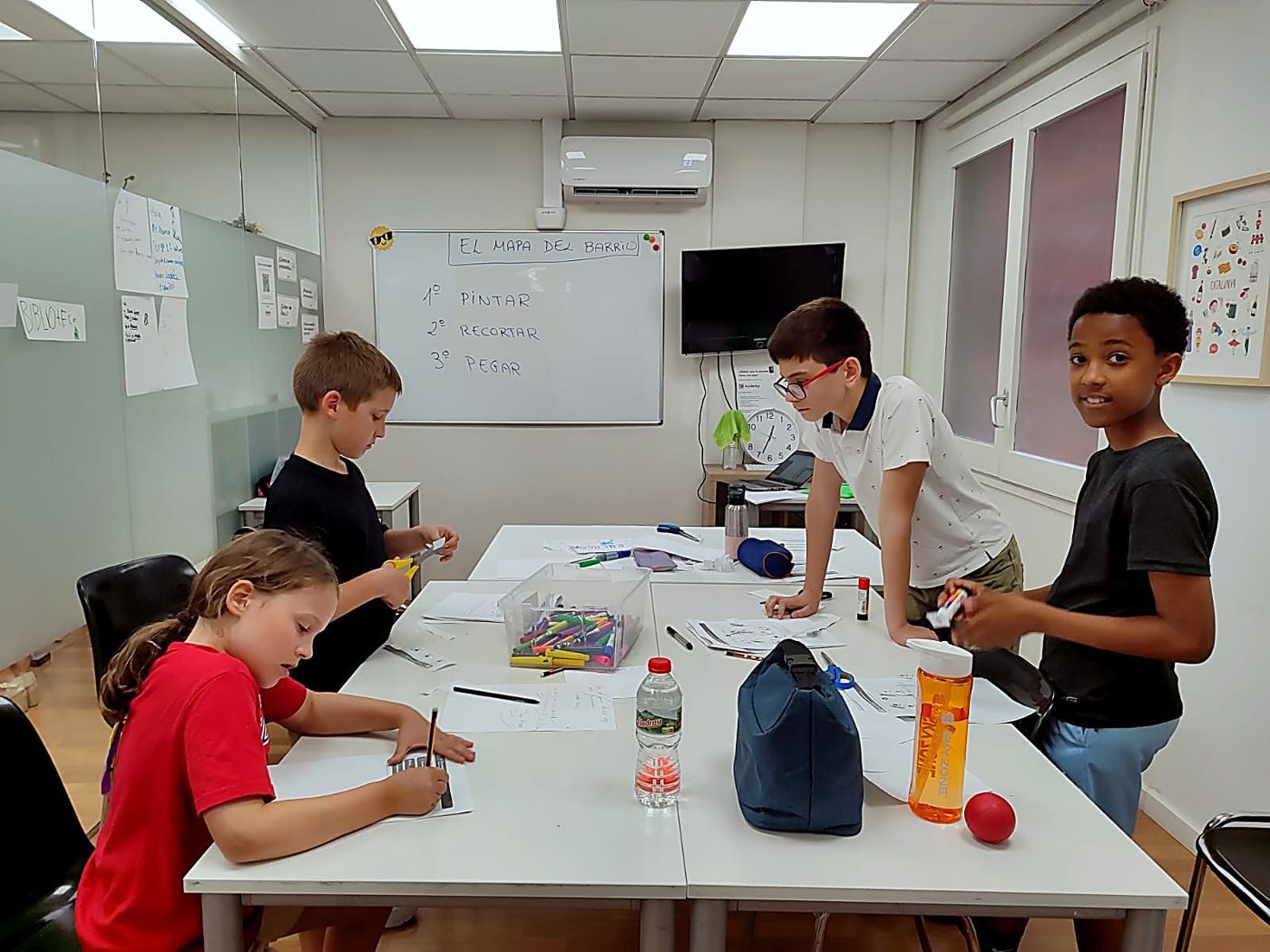 Children working on a Spanish project at Iberia Language Academy