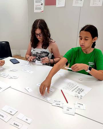 Teenagers playing a Spanish vocabulary game