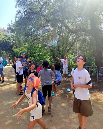Campers playing games in a Barcelona park
