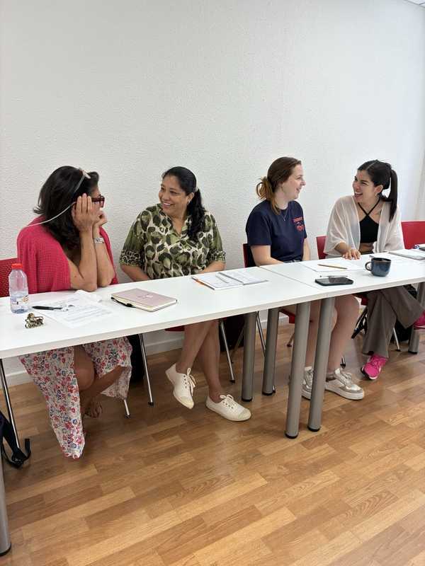 Four students in a Part-time Spanish class